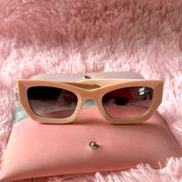 Occhiali rosa Miu Miu