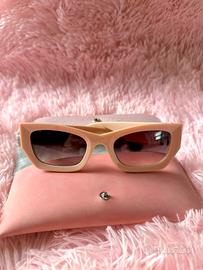 Occhiali rosa Miu Miu