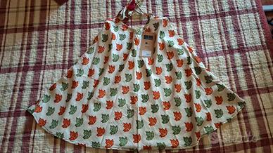 Top contro corrente con foglie nuovo