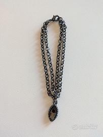 Braccialetto donna in metallo scuro con pendente
