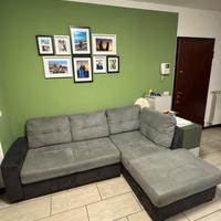 Divano letto con penisola contenitore