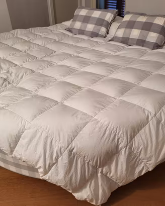 Letto Hästens rotondo originale – bianco/grigio