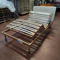 Letto con testiera in tessuto