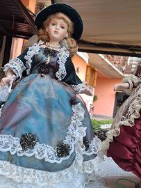 coppia di bambole in ceramica x collezionismo con 