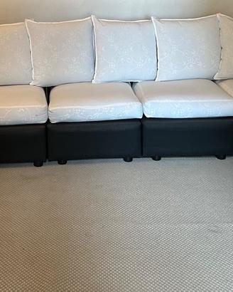 Divano modulabile in ecopelle nero e tessuto bianc