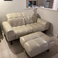 Divano due posti in pelle + puff