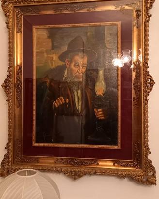 Elegante quadro con cornice dorata