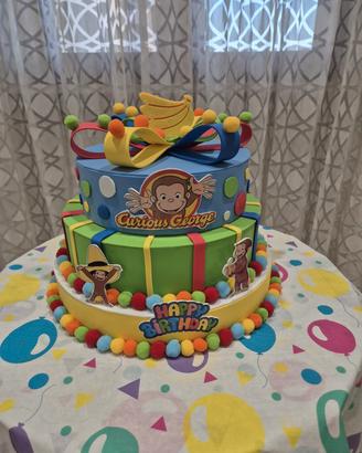 TORTA SCENOGRAFICA FINTA TEMA CURIOUS GEORGE 