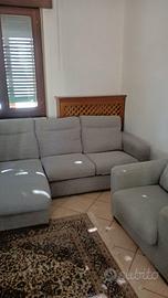 Divano e poltrona in tessuto