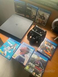 Ps4 con 2 controller, accesorio e 7 giochi.