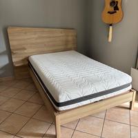 Letto una piazza e mezzo con spalliera in legno