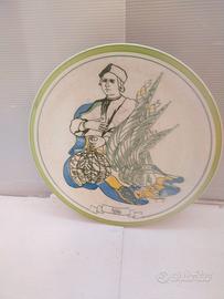 Piatto in ceramica caravella Nina Colombiadi 1992