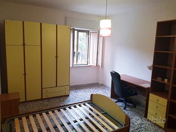 Ampia camera arredata, 2 bagni, via Is Mirrionis