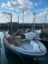 Barca per pesca alle vongole