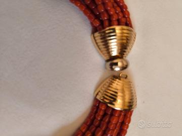 torchon corallo con chiusura oro 18 k.