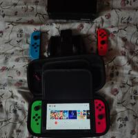Nintendo Switch 4 joy con+ scatola e custodia 