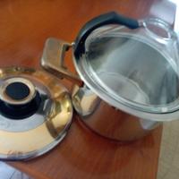 Tre pentole la più grande con due coperchi come si