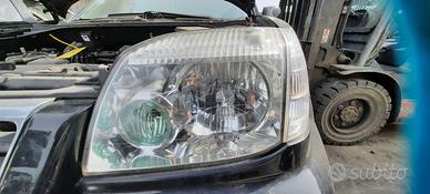 NISSAN X-TRAIL 2003 - FARO ANTERIORE SINISTRO