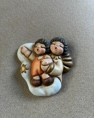 calamita angelo con bambino Thun