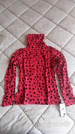 maglia rossa con pois neri
