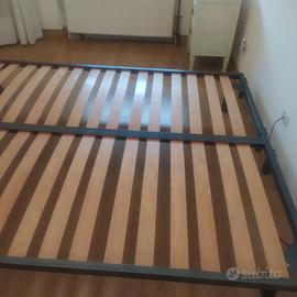 Rete  con doghe in legno + giro letto con testiera