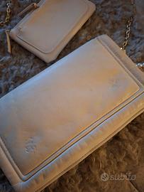 pochette in morbida ecopelle e relativo portamonet