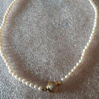 Collana con perle d'ostrica oro e diamanti 