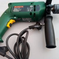 Trapano Bosch praticamente nuovo.