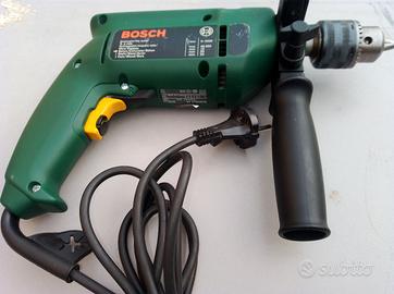 Trapano Bosch praticamente nuovo.
