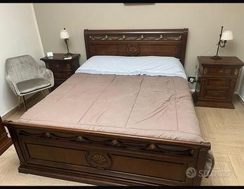 Camera da letto più tris di lampade e lampadaio