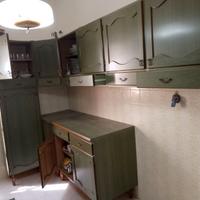 Cucina ,tavolo,sedie,divano letto,credenza, soggio