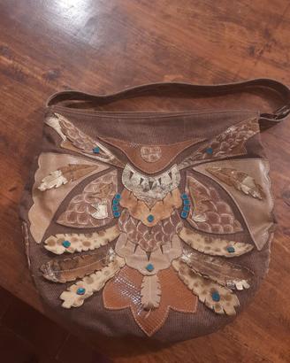 borsa in tela e pelle di Braccialini