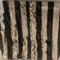 Gonna in atgento e oro