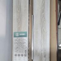 Pavimento laminato con sistema di aggancio UNICLIC