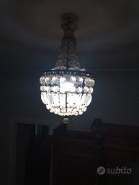 Lampadari vetro,legno ferro battuto e ottone