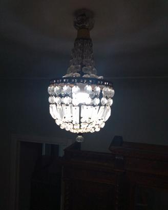 Lampadari vetro,legno ferro battuto e ottone