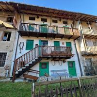 PORZIONE DI TRIFAMILIARE A POSINA