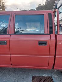 Porta posteriore sinistra Tata Telcoline del 2001