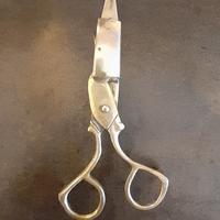 Antico spegnicandele dorato