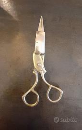 Antico spegnicandele dorato