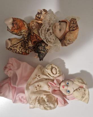 2 bambole in porcellana ,produzione veneziana, con