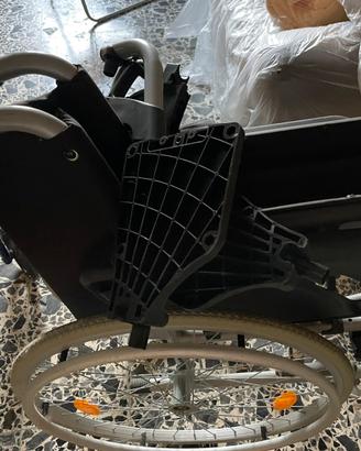 Carrozina per disabili pieghevole