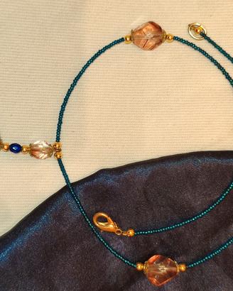 collana girocollo con pendente intagliato
