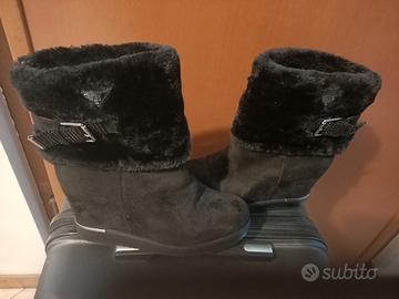 Stivali con pelliccia interna ed esterna