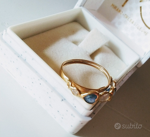 Anello con zircone e zaffiri a cuore