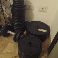 Attrezzatura palestra pesi bilanciere dischi ghisa