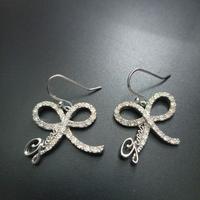 Orecchini marchio Guess