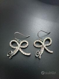 Orecchini marchio Guess