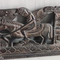 Oggetto etnico da appendere in legno