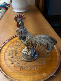 Statuina in ceramica con galletto